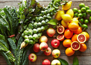 a group of fruits and vegetables on a wood surface Healthy Weight Loss Diets Oxted